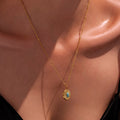 Gold Round Sunburst Turquoise Pendant Necklace Steel Chain view 3