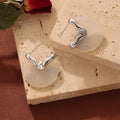 White Resin Disc Stud Earrings Wavy Metal Accent Gold Steel view 2