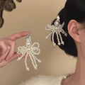 White Pearl Beaded Bow Duckbill Hair Clip Silver Ornate Top view 1