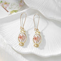 Gold Tone Candy-Shaped Pressed Flower Drop Earrings in Six Designs view 7