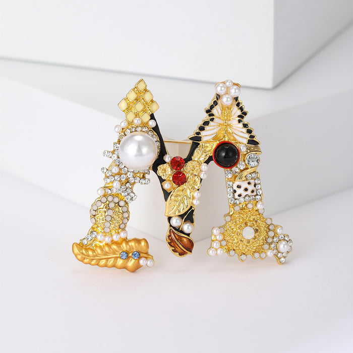 Jeweled Open Letter M Brooch With Pearl and Enamel Details