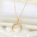 Gold Tone Multicolor Crystal Lightning and Crescent Horn Necklaces view 5