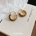 Gold Tone Leopard Print Round Huggie Hoop Earrings view 3
