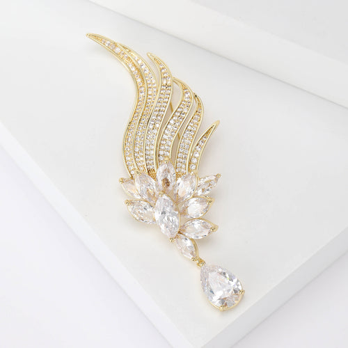 Angled display of Gold Tone Crystal Angel Wing brooch