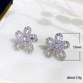 Open Flower Crystal Stud Earrings in Polished Metal view 5