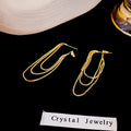 Gold and Silver Multi Chain Draped Geometric Hoop Earrings view 2