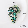 Geometric Crystal Cascade Brooch with Polished Metal and Decorative Accents view 5