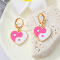 Gold Tone Crescent Disc and Yin Yang Heart Huggie Earrings view 4