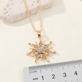 Gold Tone Crystal Snowflake Sunburst Pendant Necklace view 2