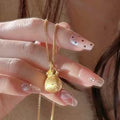 Gold Tone Gourd Pendant Necklace with Polished Rounded Shape view 1