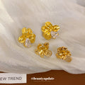 Gold Tone Sculpted Folded Petal Flower Stud Earrings view 2