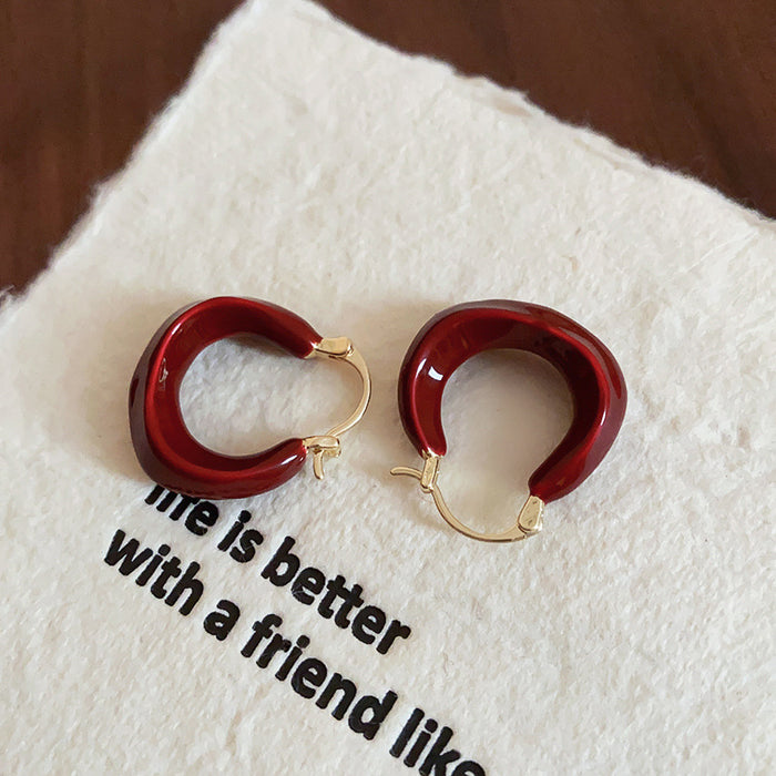 Deep Red Resin and Gold Tone Rounded Huggie Hoop Earrings