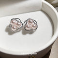 Silver Tone Floral Stud Earrings with Pink Pearl Accents view 3