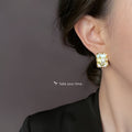 Gold Tone Rectangular Floral Frame And Irregular White Pearl Stud Earrings view 2