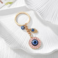 Gold Tone Round Rhinestone Evil Eye and Hamsa Keychains view 3