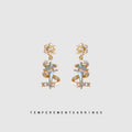 Snowflake Light Blue Spiral Ribbon Drop Earrings CZ view 1