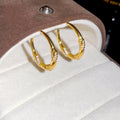 Gold Tone Textured Oval Statement Hoop Earrings Pair view 6