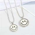 Silver Tone Reversible Smiley and Frown Spinner Pendant Necklaces view 3