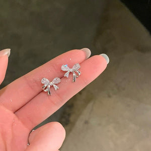 Silver Tone Crystal Bow Stud Earrings with Petite Drop Details