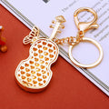Red Crystal Butterfly Guitar Keychain with Gold Tone Hardware view 4