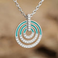 Silver Tone Concentric Circle Pendant Necklace with Turquoise Enamel view 1