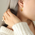 Gold And Steel Geometric Flat Band Hoop Earrings Pair view 1