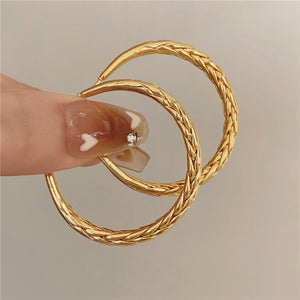 Gold Tone Braided Raised Texture Medium Hoop Earrings