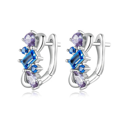Front pair shot of silver blue purple geometric huggie hoops