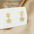 Twenty-Seven Mixed Gold Tone Stud Hoop and Dangle Earrings view 7