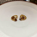 Gold Tone Twisted Hoop Earrings With Faceted Brown Square Stones view 6
