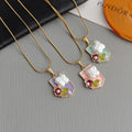 Gold Tone Shield Floral Pendant Necklace in Green Purple or Pink view 1