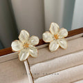 White Enamel Five Petal Flower Stud Earrings Gold Tone view 3