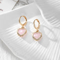 Gold Tone Crystal Heart Huggie Earrings in Seven Color Options view 3