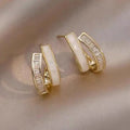 Gold Tone Layered Geometric Crystal Huggie Hoop Earrings view 2