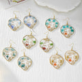 Gold Tone Abstract Face Pressed Flower Drop Earrings in Five Designs view 1