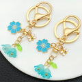 Pink or White Blossom Bee and Butterfly Keychains with Metal Hardware view 1