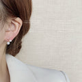 Gold Tone Twisted Loop And White Pearl Drop Stud Earrings For Women view 2