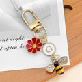Gold Tone Initial Letter Charm Keychain with Enamel Daisy and Rhinestone Bee view 10