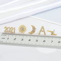Gold Tone Crystal Year, Letter and Celestial Stud Earrings in Five Designs view 5