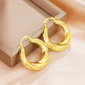 Rounded Ribbed Hoop Earrings in Silver and Gold Tones view 2