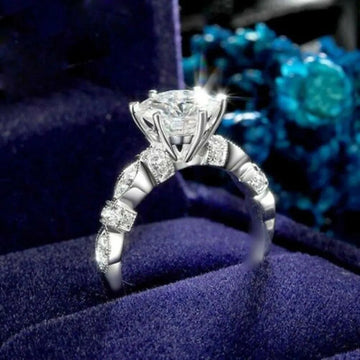 Silver Tone Round Clear Stone Graduated Side Stone Ring