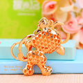 Jeweled Zodiac Cow Keychains in Pink and Red Pictured Colors view 4