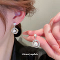 Silver Tone Clear Crystal Oval Drop Earrings in Two Designs view 4