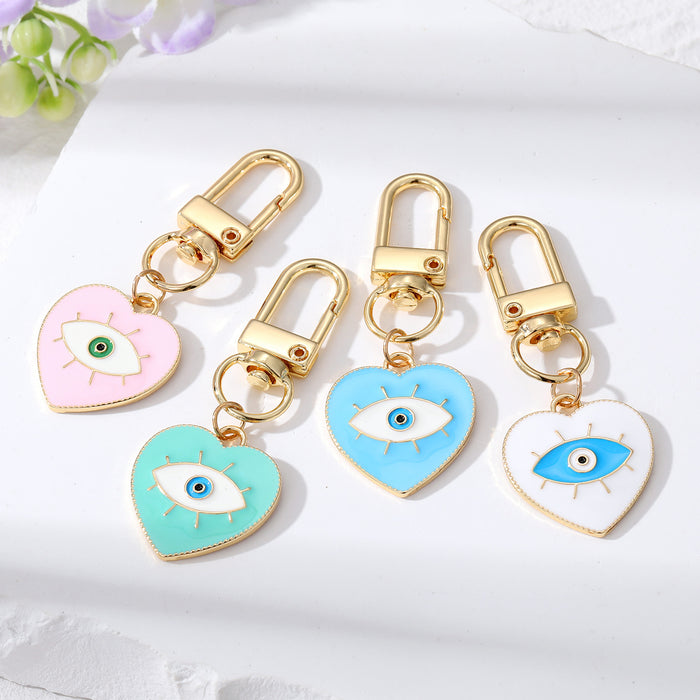 Gold Tone Heart Enamel Lash Evil Eye Clip Keychains
