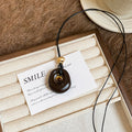 Brown Oval Resin Pendant Cord Necklace with Distinctive Textured Details view 6