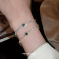 Silver Tone Clear Crystal Bracelet With Green Round Stone Accents view 1