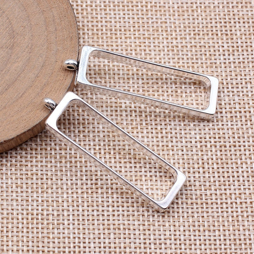 Narrow Rectangle Open Frame Pendants in Silver and Gold shown in image 2, highlighting a narrow open rectangle, rounded 