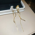 Three Petal Flower Linear Tassel Clip On Earrings With Polished Metal Details view 7