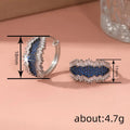 Blue And Black Crystal Textured Huggie Earrings With Clear Stone Accents view 4