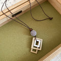 Black Cord Geometric Pendant Necklaces in Seven Designs view 7